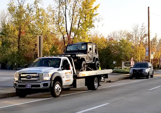 The initial phase of this study involved a tow truck, disabled vehicle, and no signage.